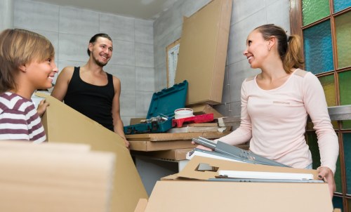 Professional house removals service in Old Oak Common with moving van and packed boxes