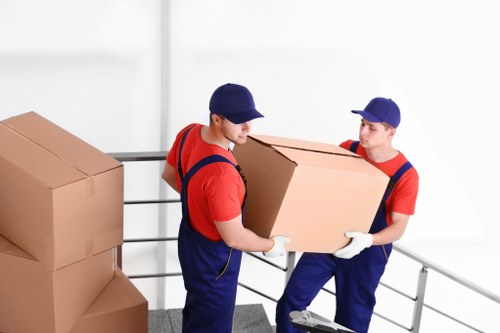 House movers working near residential streets in Old Oak Common