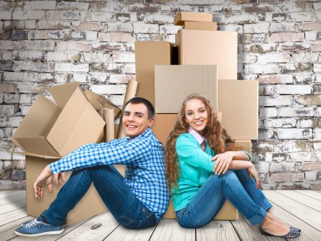 Office relocation planning in Old Oak Common with business equipment and moving boxes