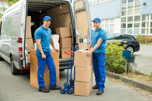 Careful loading of furniture into a removal van near Old Oak Common
