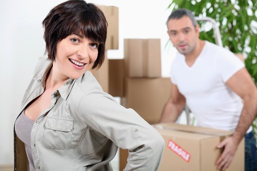 Careful loading of household furniture into a removals van
