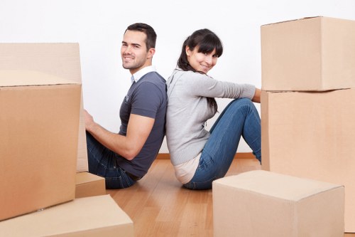 Removal team handling furniture and boxes for a local move